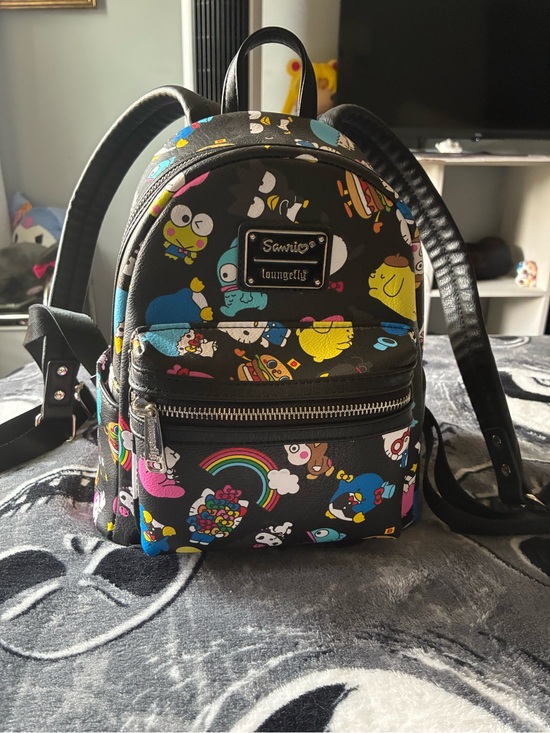 Loungefly Handbags - Loungefly Black Sanrio Character Mini Backpack with Multicolor Prints